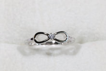 Load image into Gallery viewer, Infinity Ribbon CZ Ring in Solid Sterling Silver