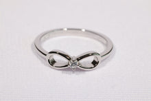 Load image into Gallery viewer, Infinity Ribbon CZ Ring in Solid Sterling Silver